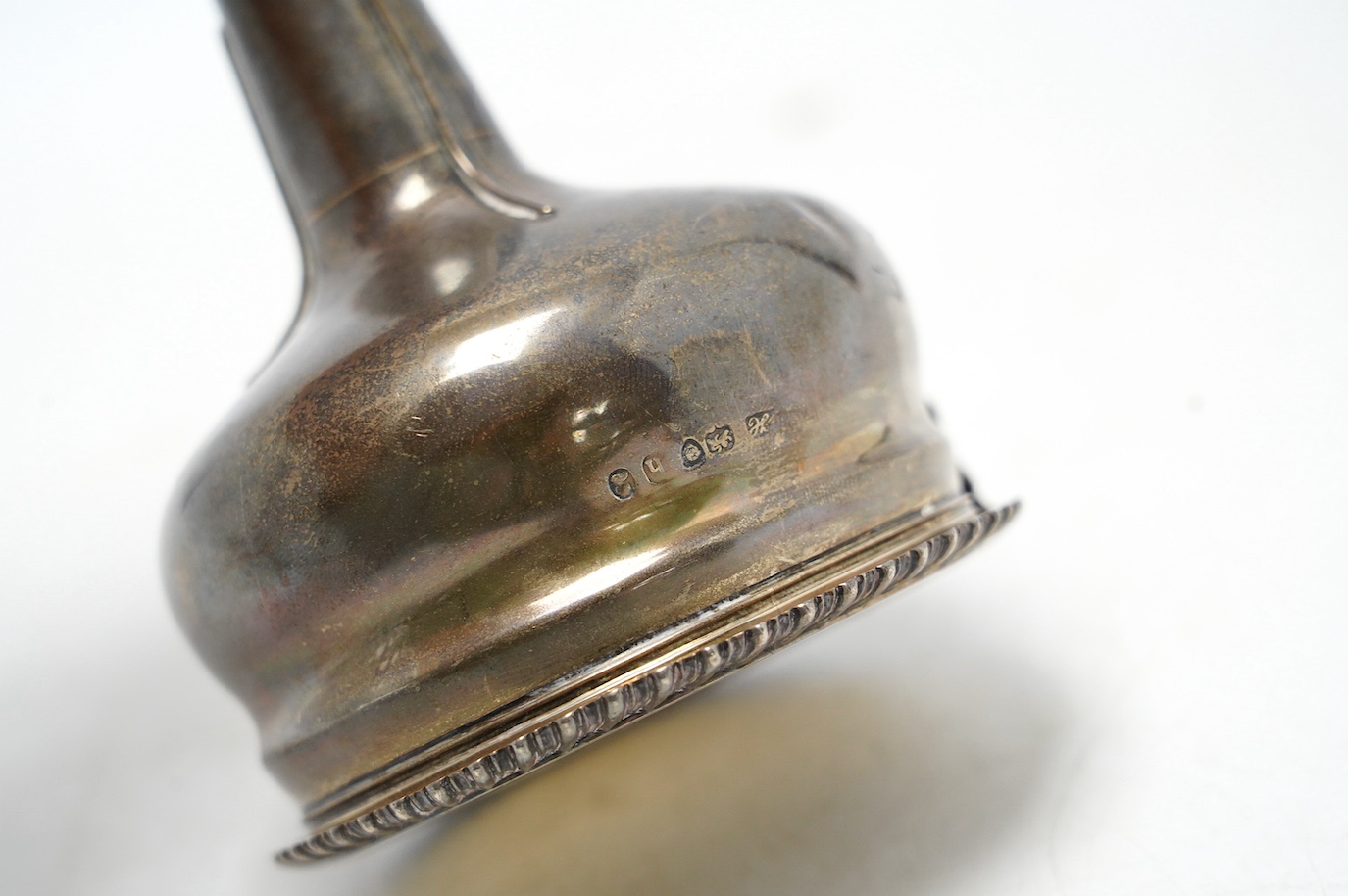 A George IV silver wine funnel, maker's mark rubbed, London, 1823, 13.2cm, 4.7oz. Condition - fair